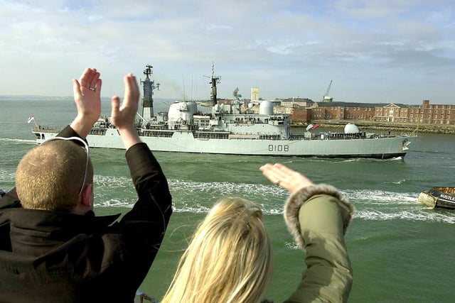 HMS Cardiff is welcomed home by families and friends at The Round Tower at Old Portsmouth 4th April 2003. Picture: Malcolm Wells\The News Portsmouth ( 031670-0042 )