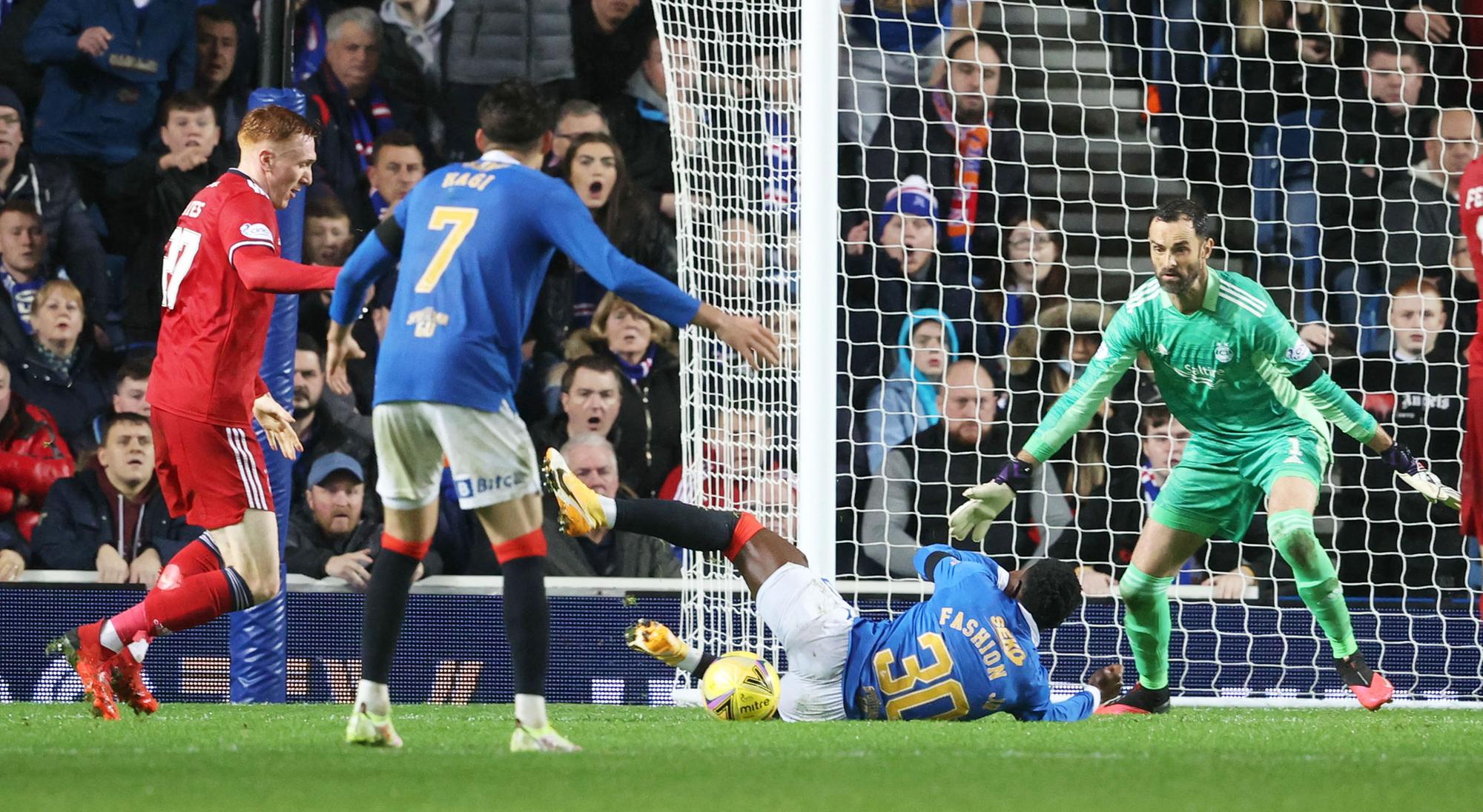David Bates is adjudged to have brought down Rangers' Fashion Sakala. Picture: SNS