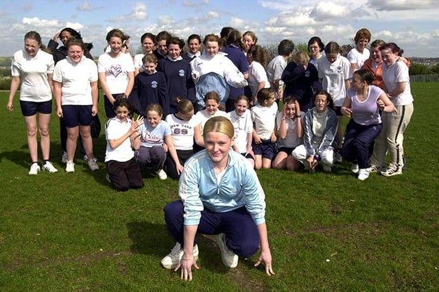 Pictured  at Westfield School, Mosborough, where pupils are in training for the Race for Life run in aid of Cancer Research. Seen at the front of the group is Clare Wright, April 29, 2002