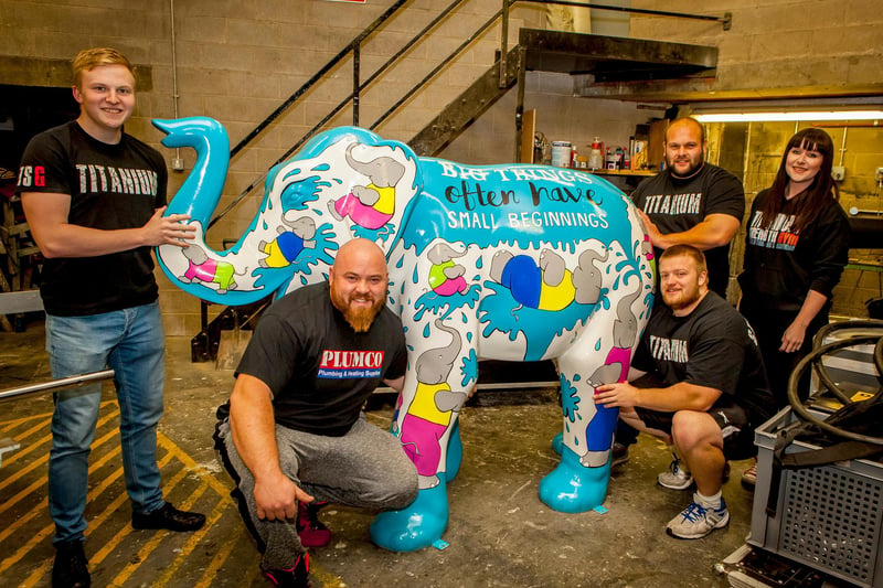 Titanium Strength Gym strong men and women who lifted the elephants on to the plinth to be auctioned at the Crucible - pictured are Scott Litchfield, Sheffield's Strongest Man, England's Strongest Man Paul Smith and helpers Daniel, Scott and Connie.