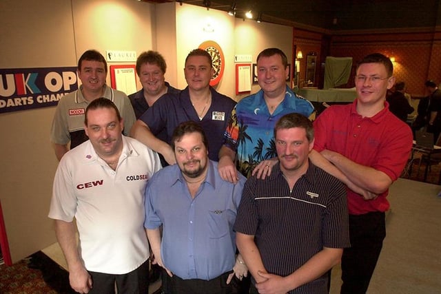 Pictured at the Sherwood Pub, Birley Moor Road before the PDC UK open darts championship, are, left to right, front, Dennis Smith, Peter Mangley and Wayne Jones, back, Ritchie Burnett, Colin Lloyd, Kevin Painter, Wayne Mardle and James Wade, January 2003