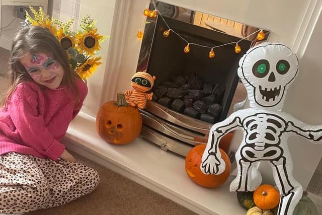 Someone's happy with their Halloween display - and rightly so!