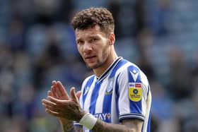Sheffield Wednesday wing-back Marvin Johnson has signed a new contract at the club.