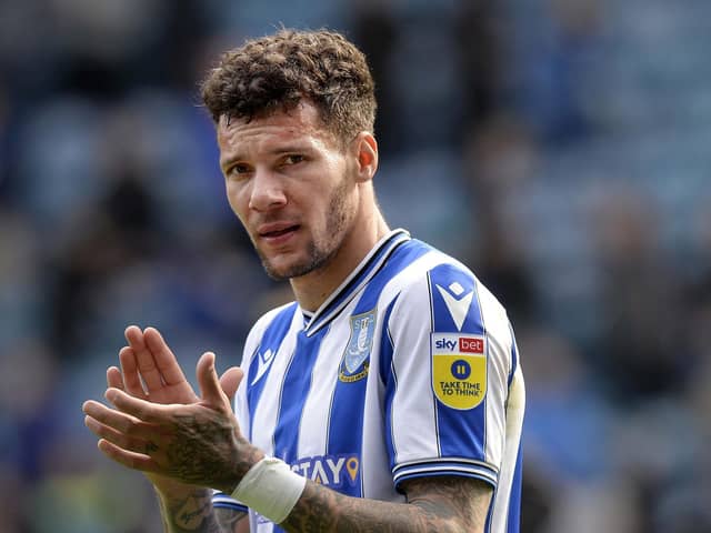 Sheffield Wednesday wing-back Marvin Johnson has signed a new contract at the club.