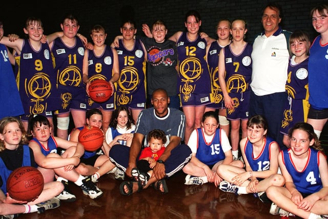 Members of two Doncaster Girls Basketball teams The Panthers and Doncaster along with fo rmer  Sheffield Sharks player  Garnet Gayle(Centre) who came along to the Adwick Sports Centre to lend his support for a Girls U13   North of England Basketball Tournament in 1997