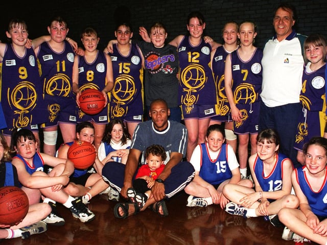 Members of two Doncaster Girls Basketball teams The Panthers and Doncaster along with fo rmer Sheffield Sharks player Garnet Gayle(Centre) who came along to the Adwick Sports Centre to lend his support for a Girls U13 North of England Basketball Tournament in 1997