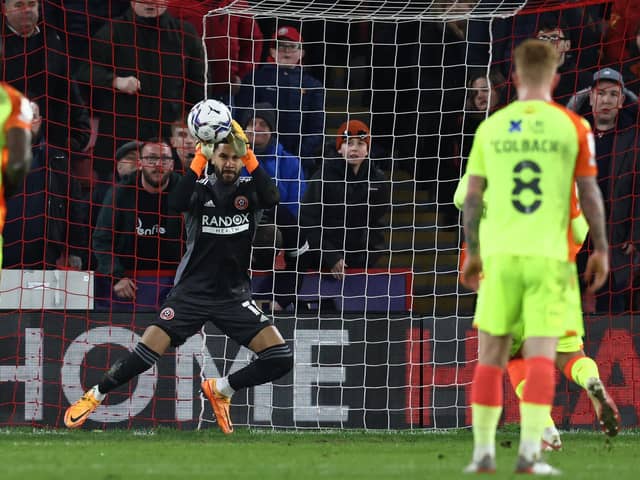 Wes Foderingham of Sheffield United makes a penalty save from Brennan Johnson of Nottingham Forest during the Sky Bet Championship match at Bramall Lane, Sheffield: Darren Staples / Sportimage