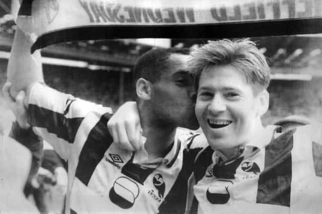 Sheffield Wednesday icons Mark Bright and Chris Waddle share an amorous moment after their 1993 FA Cup semi-final win over Steel City rivals Sheffield United.