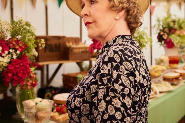Mrs Pumphrey (Patricia Hodge) in the cricket marquee, filmed at Fountains Abbey Deer Park