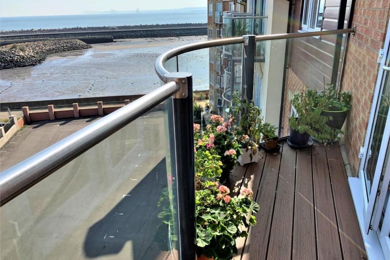 One of two balconies overlooking the seafront.