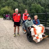Cycling Without Age riders John and Jill  (holiday makers with Dementia Adventure) on the Monsal Trail with pilots Peter Wozencroft and Clare Rishbeth