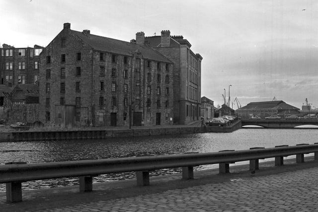 The derelict warehouses at Commercial Wharf by the Water of Leith, February 1982.