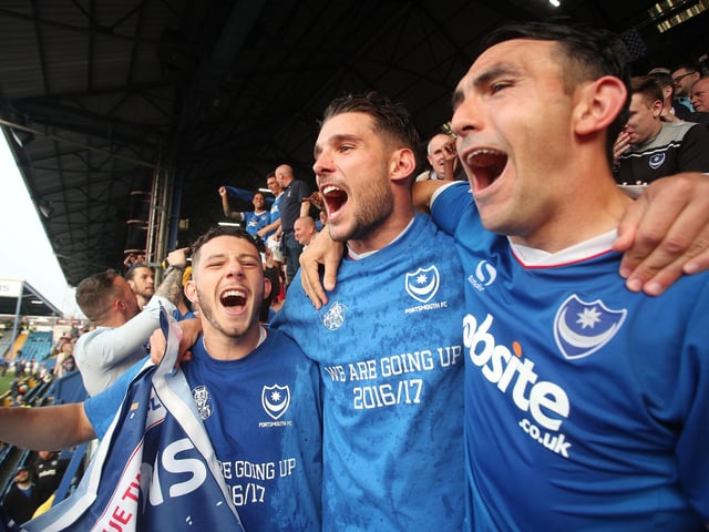 Conor Chaplin, Gareth Evans and Gary Roberts celebrate.