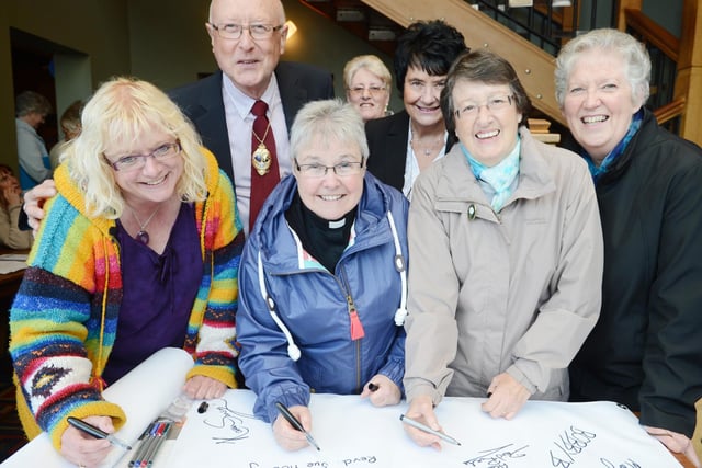 Signing the People's Gallery banner in The Church House pub back in 2012 were l-r Melanie Swannick, of Wath, deputy mayor of Rotherham John Foden, Rev Sue Hobley, deputy mayoress of Rotherham Kath Foden, Irene Hartley, of Wath, Barbara Sorby, and Dorothy Matthewman, both of Brampton Bierlow
