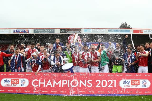 Cheltenham Town were promoted to League One after securing the League Two title last season (Photo by Matthew Lewis/Getty Images)