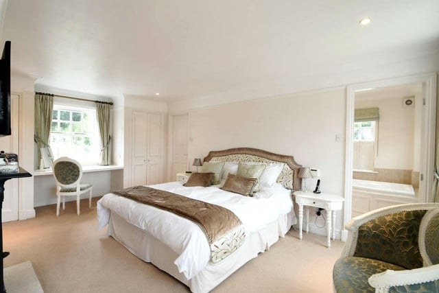 There are six bedrooms throughout the property in total, with the master benefitting from an en-suite bathroom, a walk-in dressing room and windows to both the front and rear offering views over the grounds.