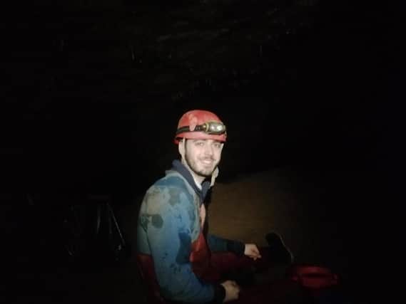 Inside Peak Cavern, on a ledge in a more spacious part of the system.
