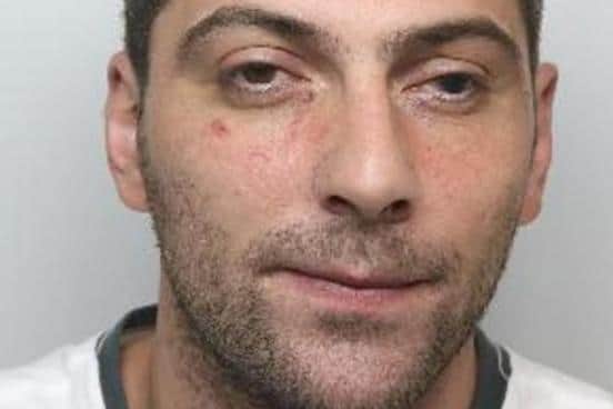 Pictured is Kamran Kerr, aged 30, of Convent Walk, Sheffield, who was sentenced at Sheffield Crown Court to 15 months of custody after he pleaded guilty to two offences of breaching a restraining order, three counts of criminal damage, an assault, a theft and two counts of assaulting a police officer.