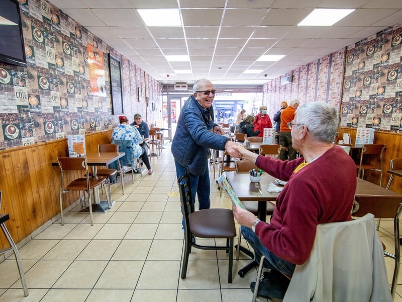 Friends veteran Clive Sutton and Ian Noble get together in Cafe Nut, Portsmouth. Picture: Habibur Rahman