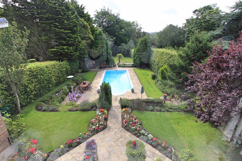 Outdoor pool to the rear of the property.