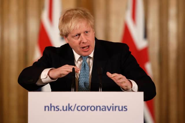 British Prime Minister Boris Johnson gives a press conference about the ongoing situation with the coronavirus (COVID-19) outbreak (Photo by Matt Dunham - WPA Pool/Getty Images)