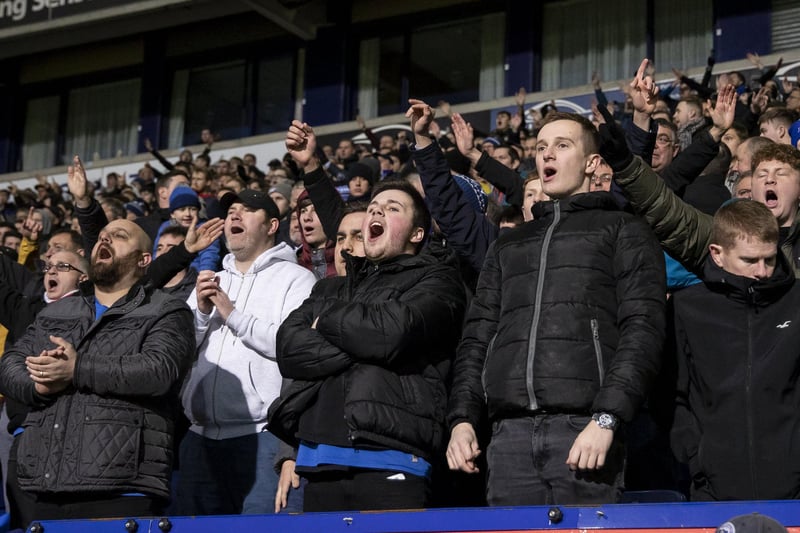 Supporters cheer on their side at Bolton last season.