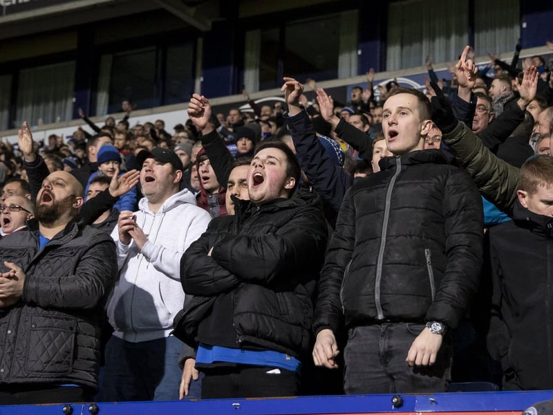 Supporters cheer on their side at Bolton last season.