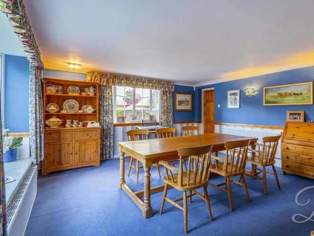 The dining room from another angle. As you can see, it has the added advantage of two large windows, flooding through lots of natural light.