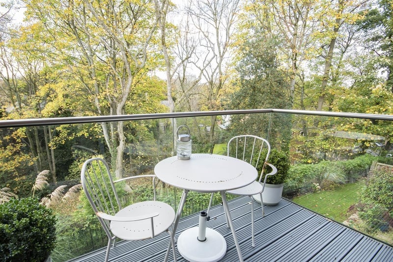 This apartment offers views deep into the surrounding woodland.