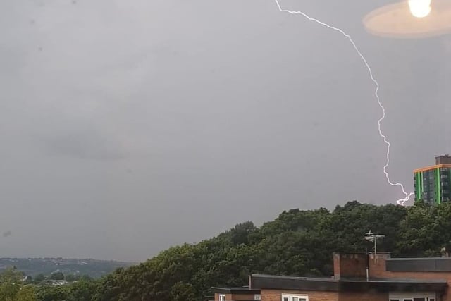 Near Callow Mount flats in Gleadless, residents captured the exact moment lightning struck Sheffield. The image taken by Corey Roberts from his bedroom shows how the electric bolt lit up the dark grey clouds.