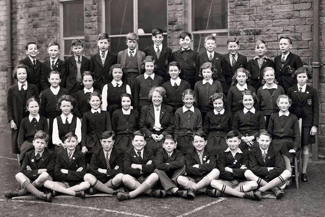 Reader Graham Youle sent in this picture of Greystones Secondary School, form 1A, 1954. 
Graham is second from the right, front row.