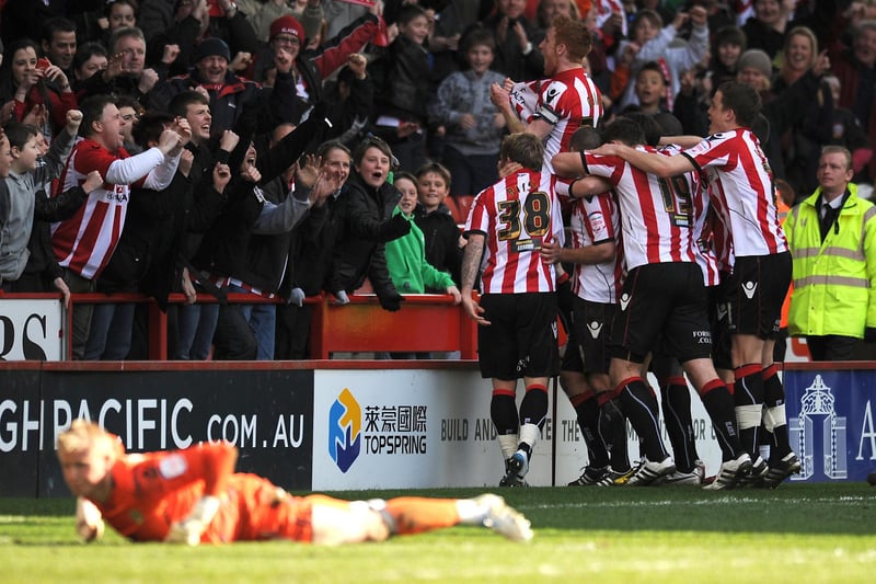 Sheffield United's Bjorn Riise (38) celebates with his team mates and the fans after scoring at Bramall Lane