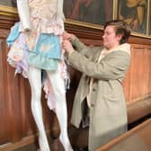 Student Danni Ward with her Georgian-inspired fashion design, on show in the Chapel at Wentworth Woodhouse