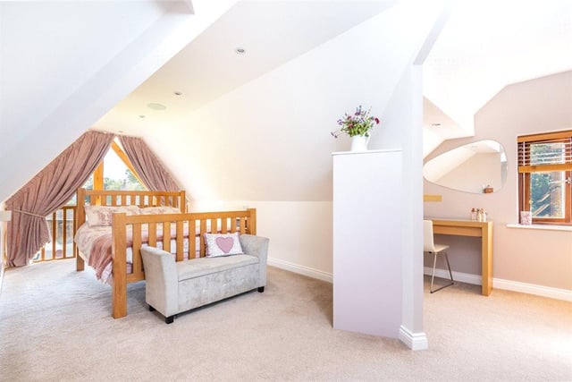There are five bedrooms in total, with the master bedroom benefitting from fitted wardrobes, a make-up area, en-suite, and a balcony which sits over the orangery.