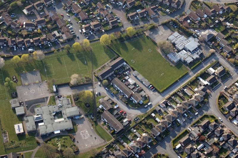 Two schools next to each other, Leen Mills Primary on the left and Holy Cross Catholic Primary on the right