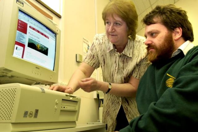 Shelia Ireland giving a lesson in IT at Mexborough Library in 2001. Her pupil was Stewart Phillips.