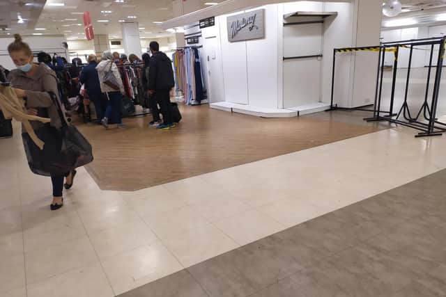 Shoppers carried away the last of the clothing bargains in Debenham's last ever sale at its Sheffield store