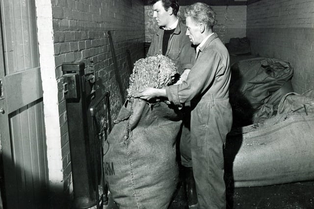Mr Harry Gibson and Mr John Elvin weighing hops at Tennants brewery, Sheffield, in 1963