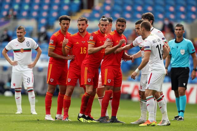Wales’ Ethan Ampadu, Tom Lockyer, Gareth Bale and Hal Robson­-Kanu (left-right) line up and compete for positioning as they wait for a free kick to be taken during the UEFA Nations League Group 4 match at Cardiff City Stadium, Cardiff.  David Davies/PA Wire.