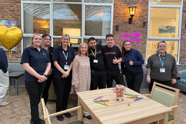 Staff celebrate the opening of the 'social hub' at The Fields in Sheffield