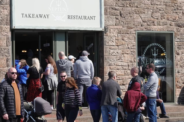 Queues outside a fish and chip shop in Seahouses on Good Friday 2019. Picture by Jane Coltman