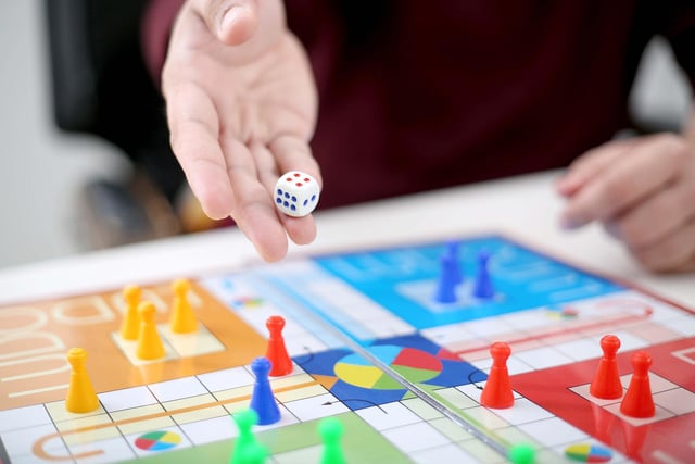 Race around the board with two to four players. You can also play Frustration, a similar game.