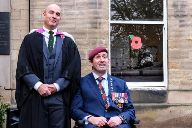 Headmaster Chris Hattam with special Remembrance Day guest Ben Parkinson