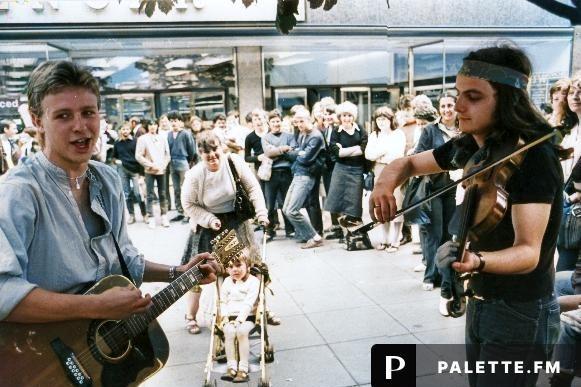 Buskers, Rick Baines (guitar) and Patrick Walker (fiddle) in action before a crowd in Fargate, Sheffield - 14th July 1981. Picture: Sheffield Newspapers