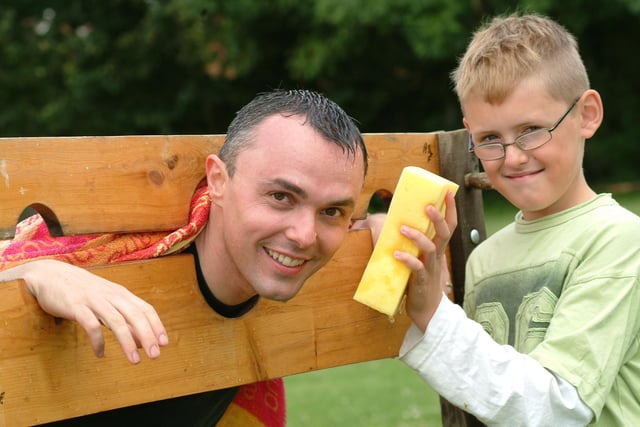 Pupil Euan Booker- Parkinson, 10 with his future teacher Joe Kilner at the summer fair in 2009