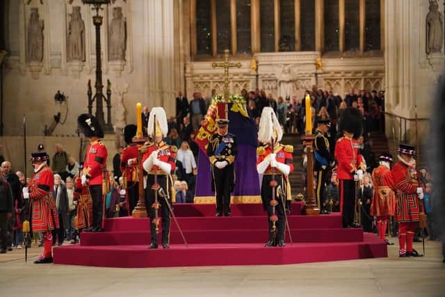 LONDON, ENGLAND - SEPTEMBER 16: King Charles III stands vigil beside the coffin of his mother, Queen Elizabeth II, as it lies in state on the catafalque in Westminster Hall, at the Palace of Westminster, on September 16, 2022 in London England. (Photo Dominic Lipinski - WPA Pool/Getty Images)