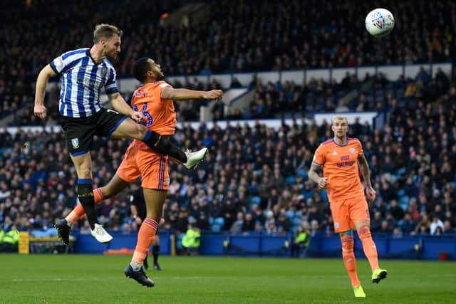 SHEFFIELD, ENGLAND - DECEMBER 29: Tom Lees of Sheffield Wednesday scores his side's first goal during the Sky Bet Championship match between Sheffield Wednesday and Cardiff City at Hillsborough Stadium on December 29, 2019 in Sheffield, England. (Photo by George Wood/Getty Images)