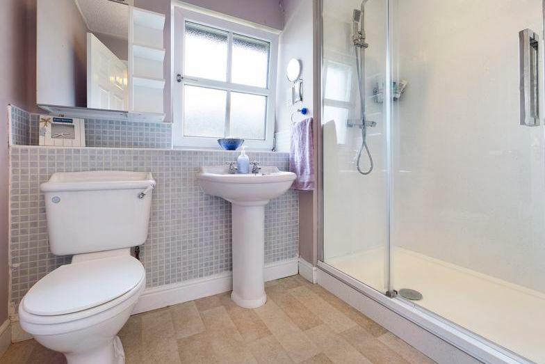 En-suite shower room is incredibly well appointed and only adds to the master suite's appeal.