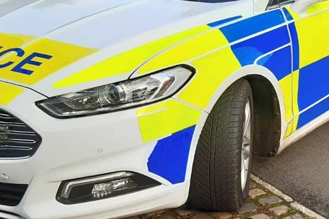 A South Yorkshire Police officer has been arrested on suspicion of child sex offences, from over 15 years ago. File picture shows a police car.