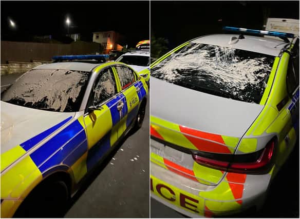 Paint was daubed over a police car in Sheffield when officers arrived at the scene of a disturbance at a family home
